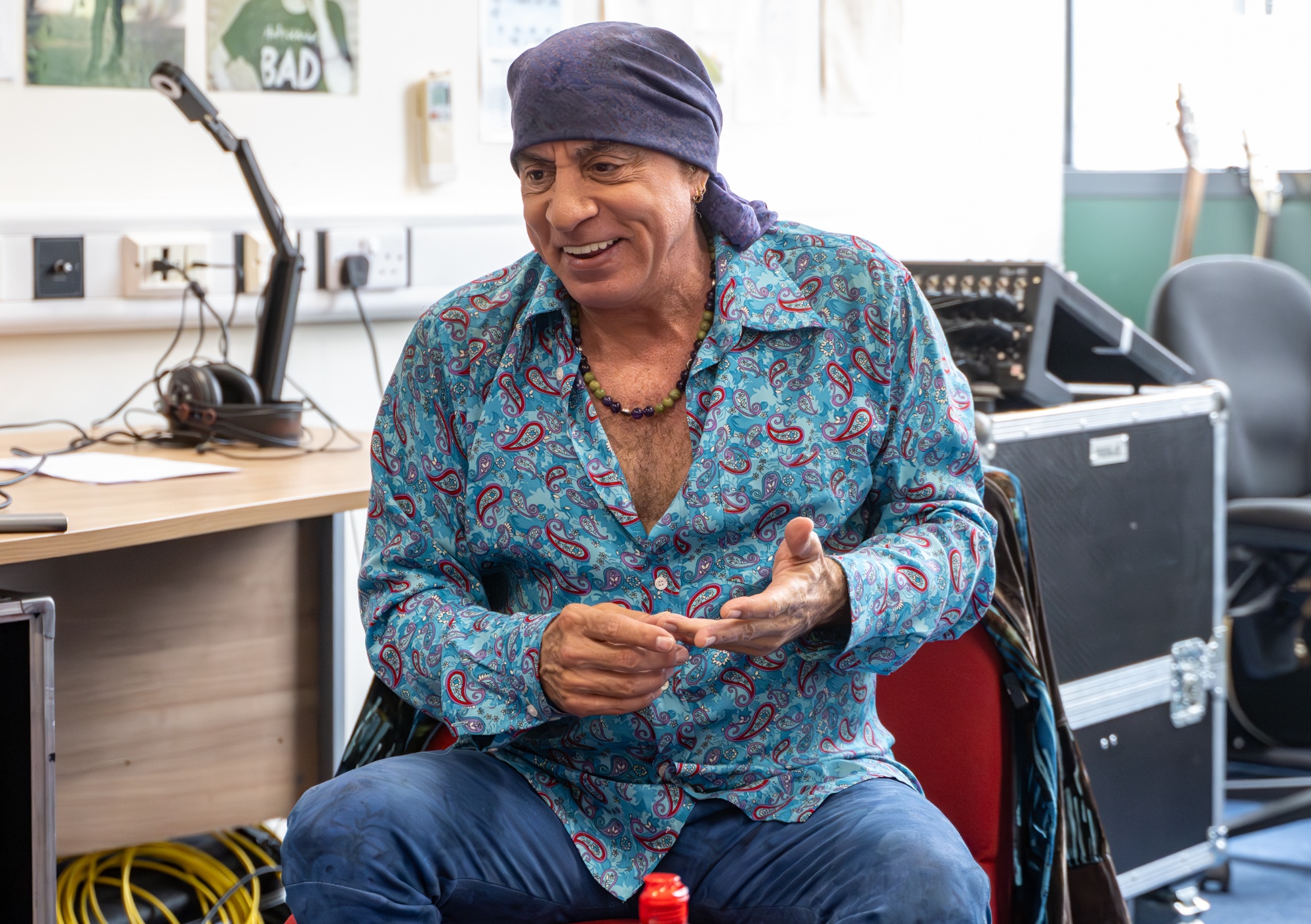 Steve Van Zandt laughs as he talks to the students during his talk